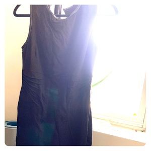 Black leather trimmed form fitting dress
